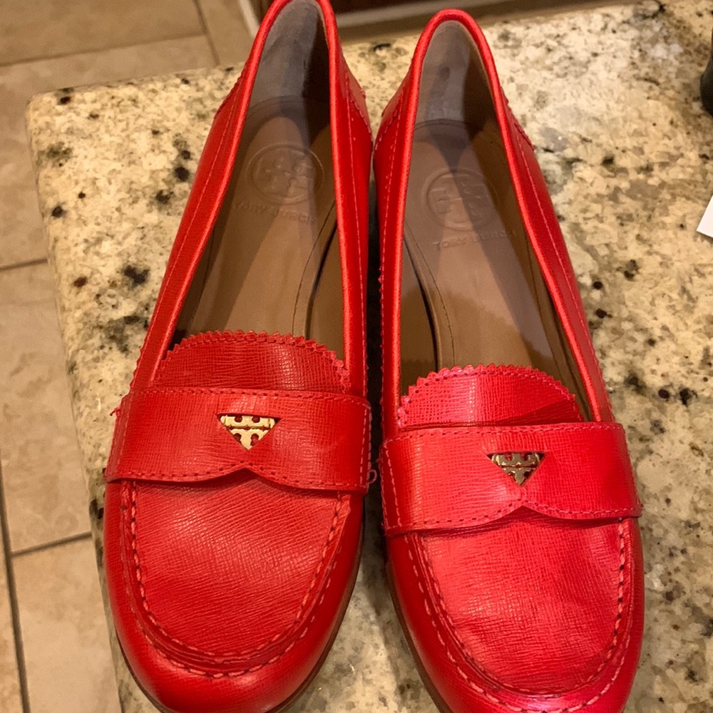 New Tory Burch red loafers. Size 8M beautiful stitching around shoe. Symbol gold